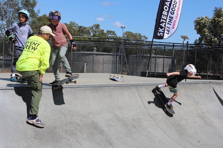 Kids on skate ramp