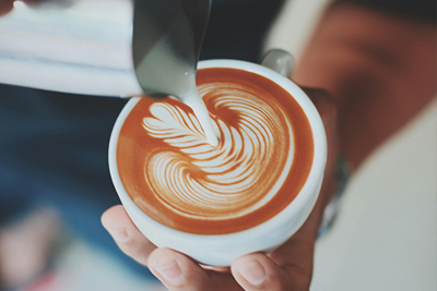 Barista making coffee